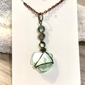 1. Light green sea glass necklace with abalone beads